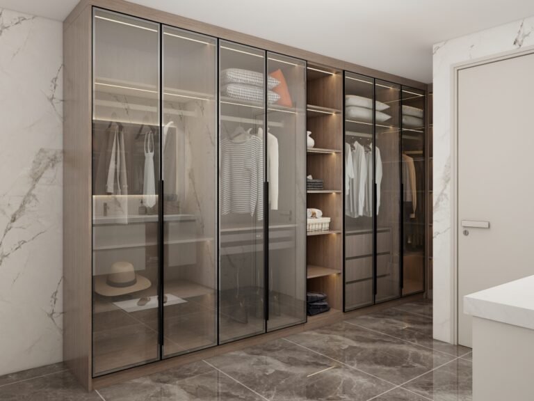 Sleek modern bedroom wardrobe with glass doors and integrated LED lighting