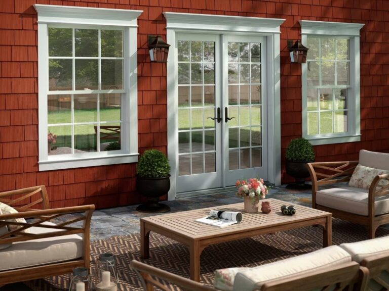 PAhome aluminum French swing doors with clear divided-lite glass opening to patio