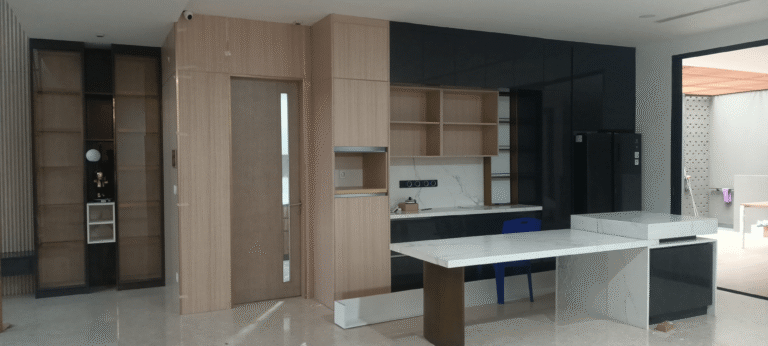 Indonesia Full House Customization - Modern kitchen with black and wood custom cabinetry.