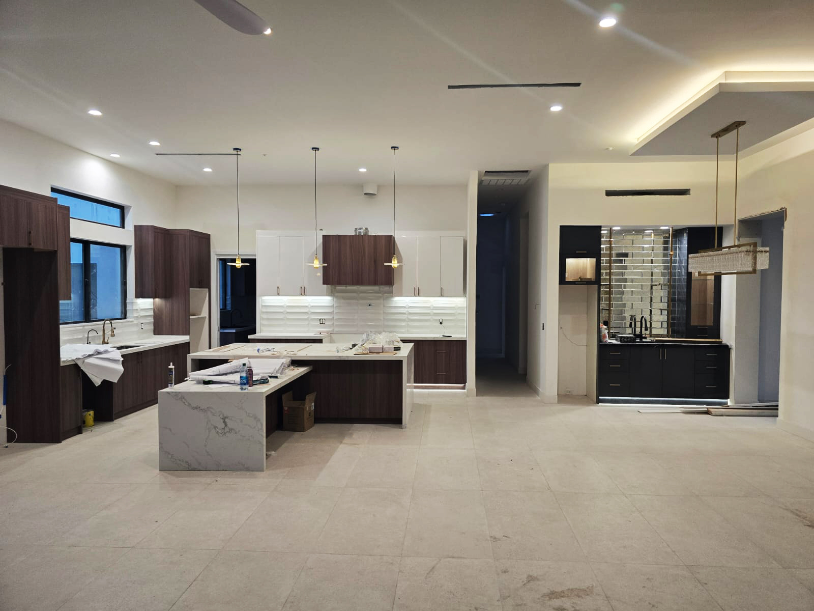 Custom living room with contemporary design, minimalist furniture, and modern lighting.