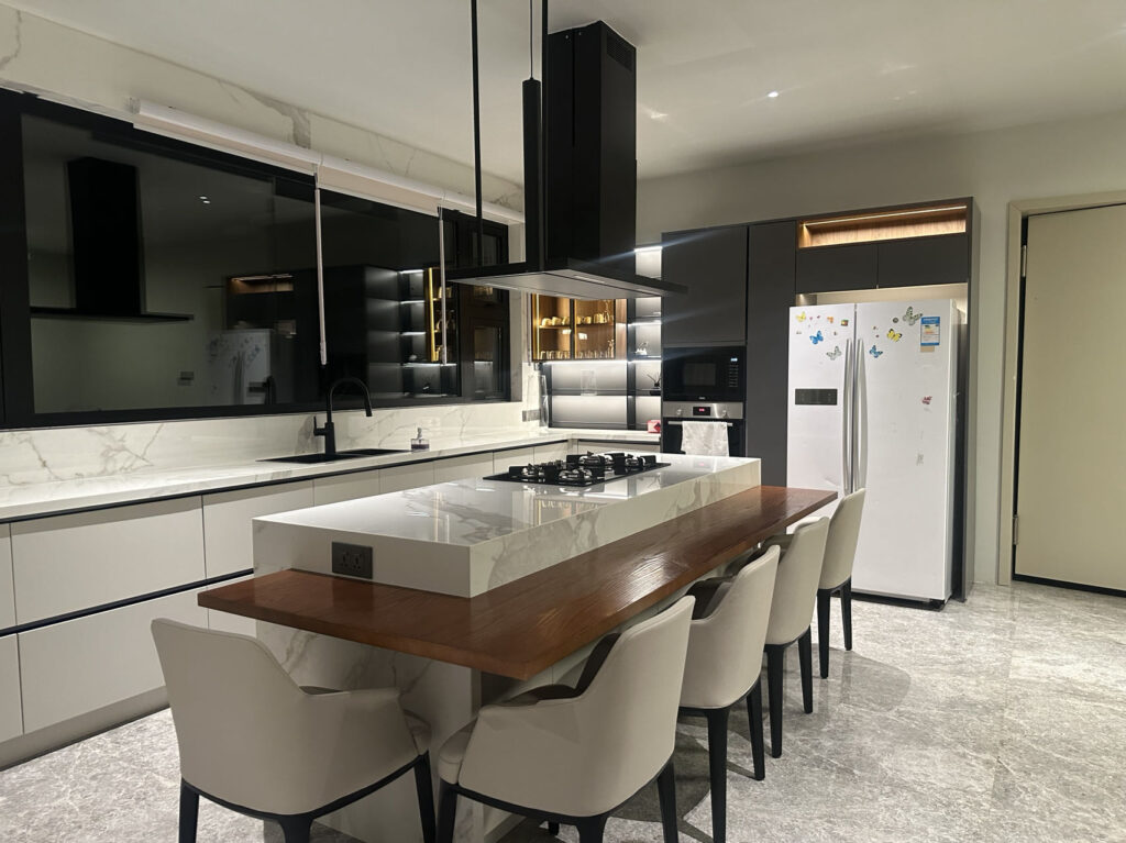 10 Perusahaan Kustomisasi Rumah Lengkap Terbaik di Semarang 2026 1 kitchen cabinetry with ambient lighting at dusk