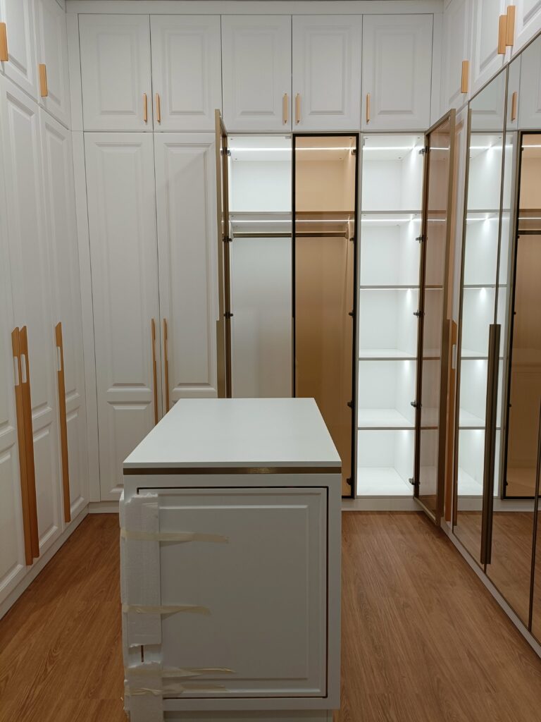 South Jakarta custom cabinets - walk-in closet with stylish mirrored doors
