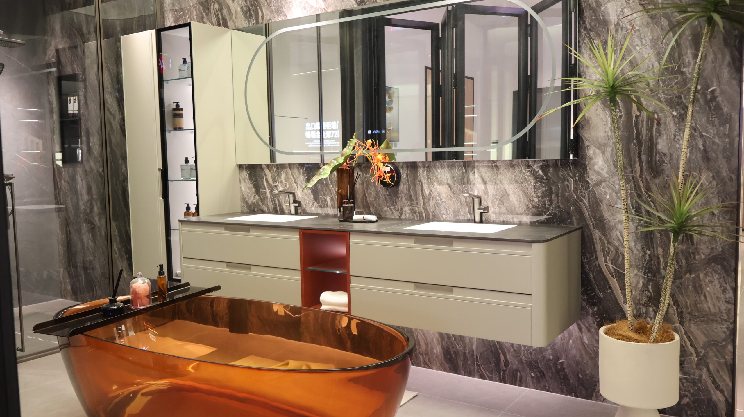 modern bathroom with freestanding acrylic bathtub and wall-mounted vanity