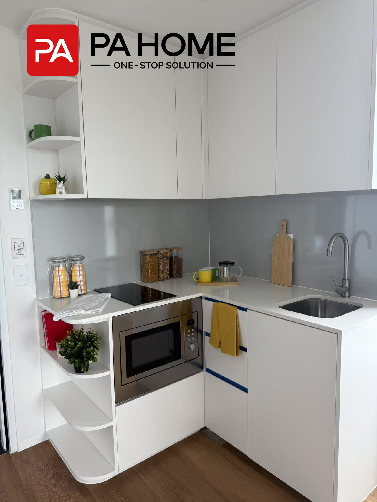 Custom Furniture & Cabinetry for 308-Unit Student Apartment Project in Sydney 6 Custom l-shaped compact kitchen cabinet with built-in storage in a student apartment in Sydney.
