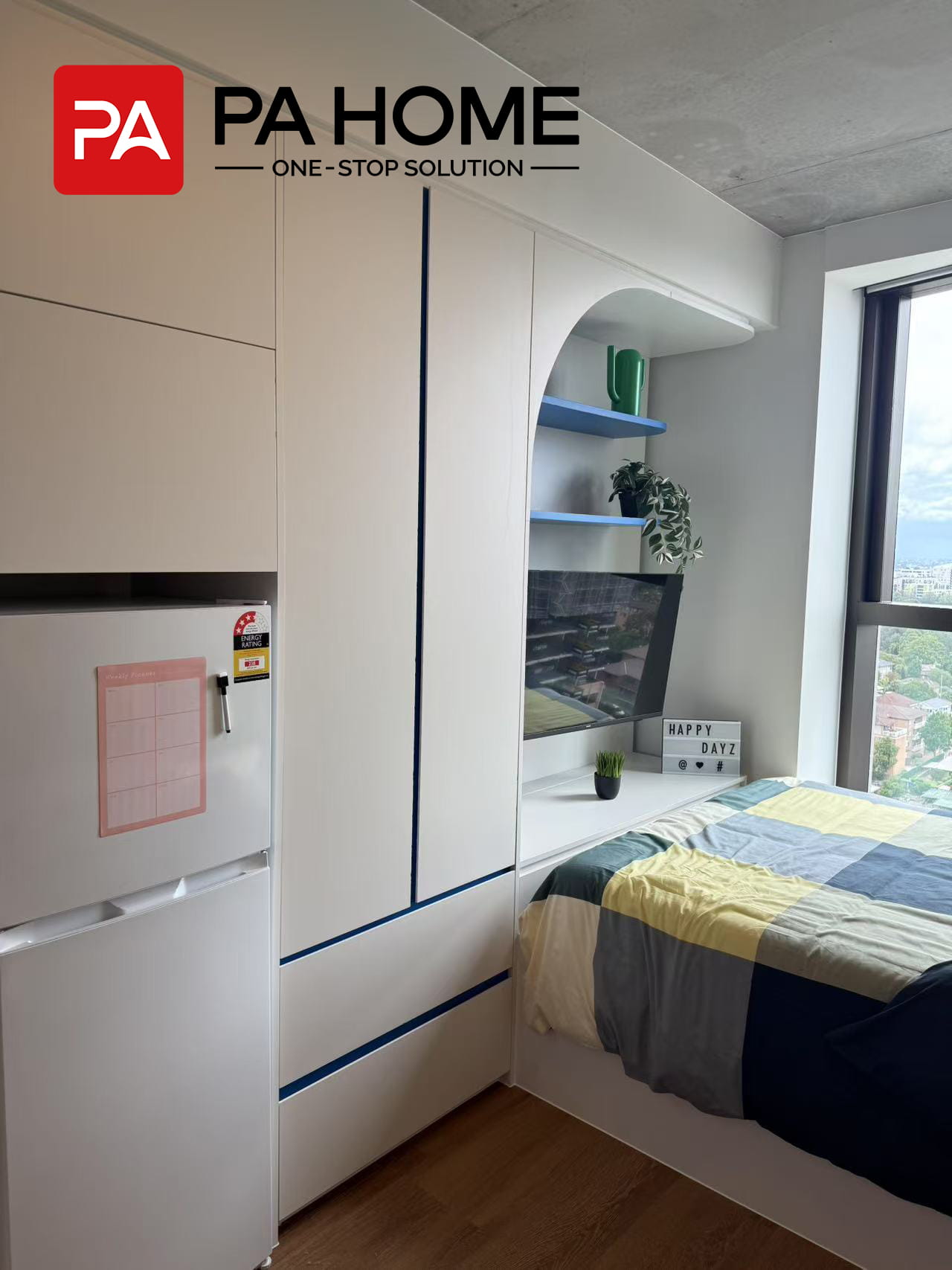 Custom Furniture & Cabinetry for 308-Unit Student Apartment Project in Sydney 3 Custom built in wardrobe with tv and open shelf in a student apartment in Sydney, featuring storage compartments.