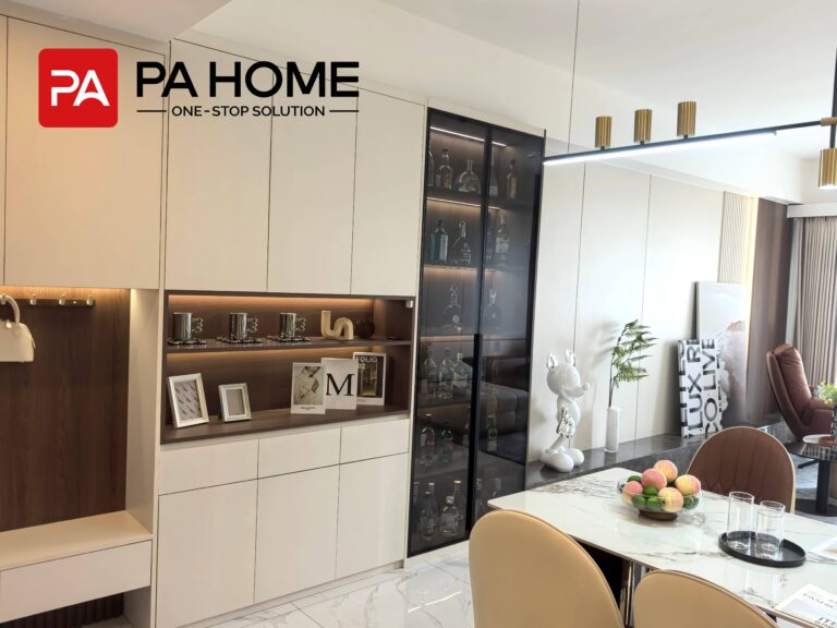 Living room with custom storage cabinets, glass display cabinet, wall panels, and dining area. in Tangerang whole house custom project.