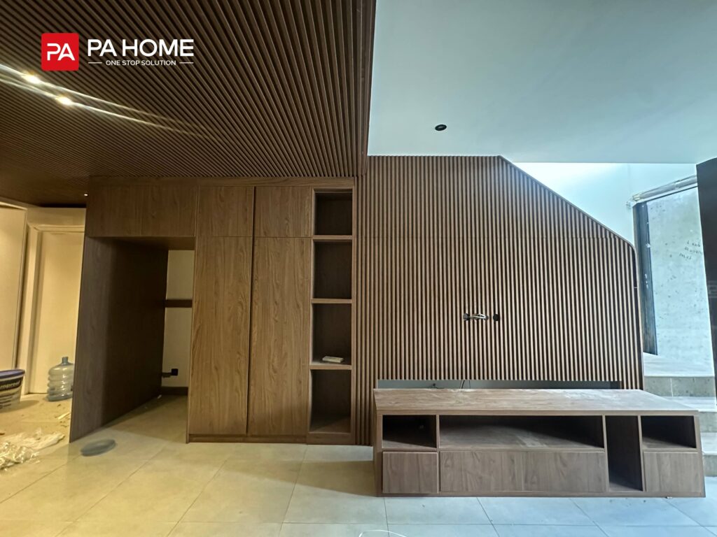11 Sets Umalas Creek Villa Custom Cabinets in Bali 11 Umalas Creek Villa Custom Cabinets Project living room media wall with slatted panel and walnut veneer console