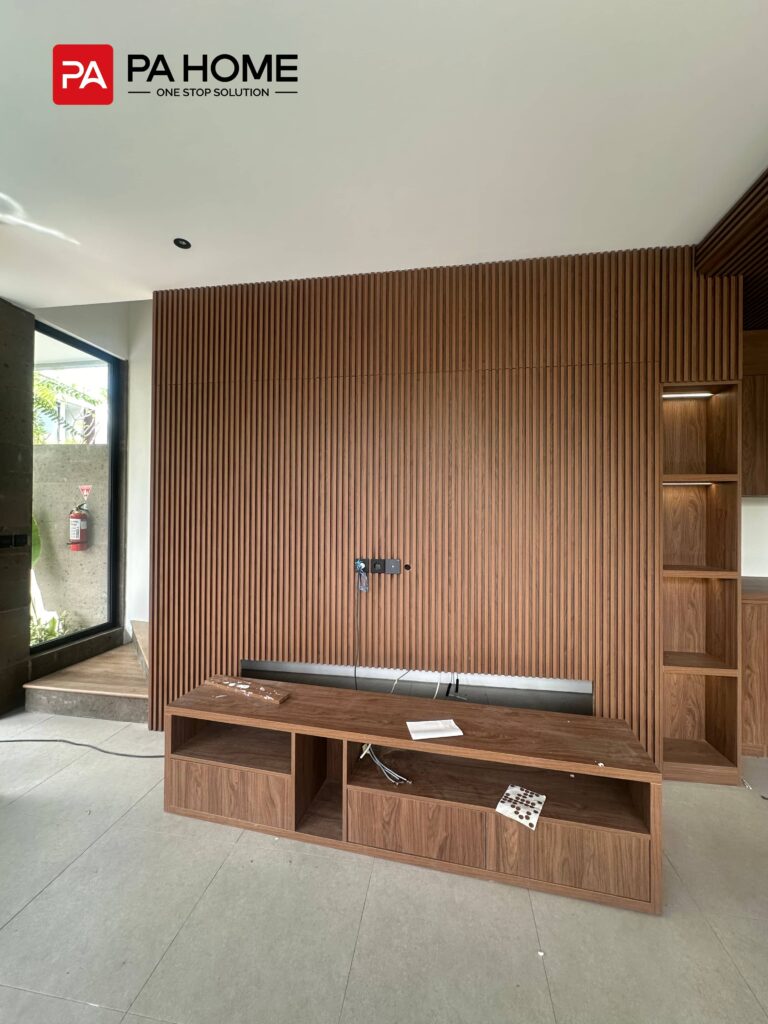 11 Sets Umalas Creek Villa Custom Cabinets in Bali 10 Umalas Creek Villa Custom Cabinets Project slatted wood media wall with custom walnut veneer console