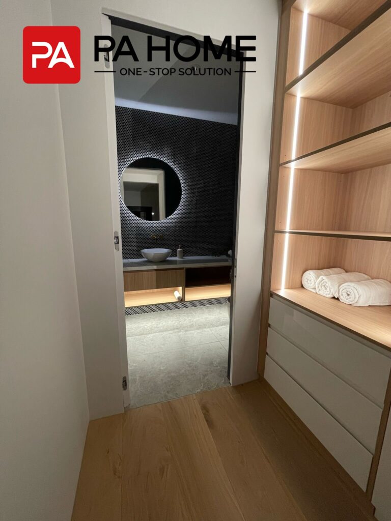 Luxury Whole House Custom in Melbourne 11 timber-lined-doorway-view-into-illuminated-vanity-shelving