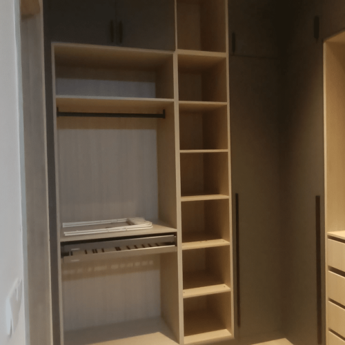 Indonesia Full House Customization - Wardrobe interior with custom shelves and hanging space.