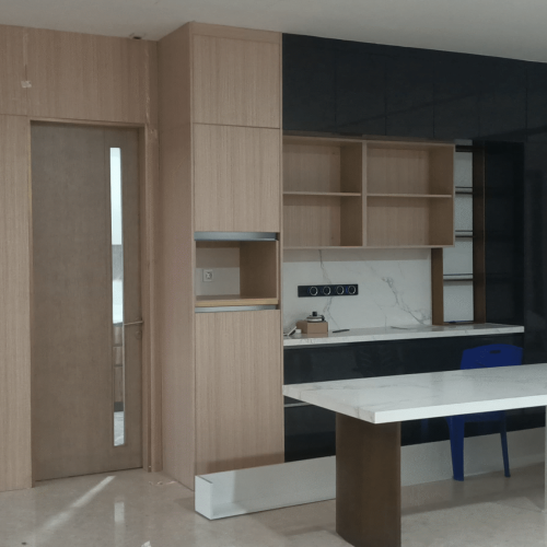 Indonesia Full House Customization - Modern kitchen with black and wood custom cabinetry.