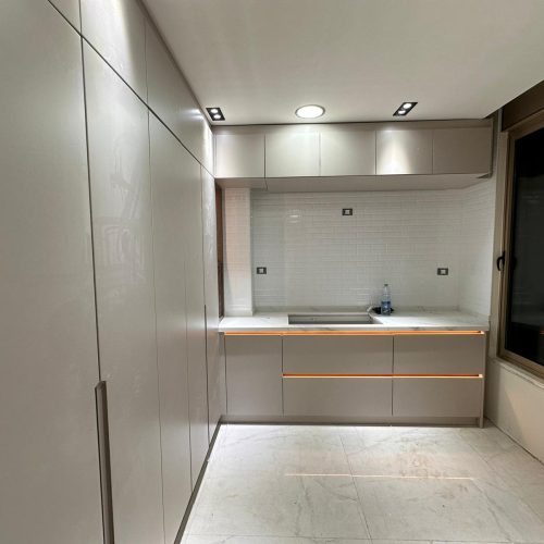 Modern kitchen with sleek kitchen cabinets in Palestine custom cabinet project.