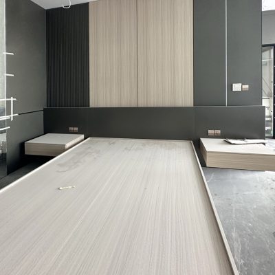Indonesia Mirrored Room Custom Cabinets bedroom with sleek, modern design and light wood accents.
