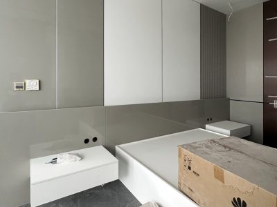 Indonesia Mirrored Room Custom Cabinets 7 Indonesia Mirrored Room Custom Cabinets with gray and wood paneling in a bedroom setting.