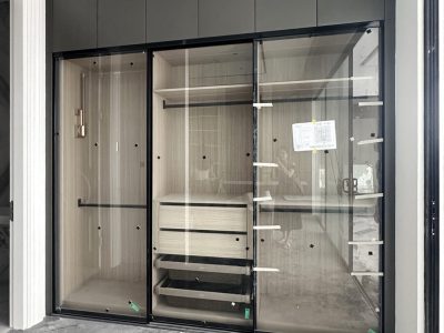 Indonesia Mirrored Room Custom Cabinets 1 Custom wardrobe with transparent glass doors in a mirrored room style, designed for the bedroom.