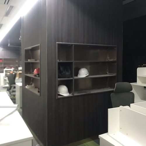 built-in office cabinet with open shelving in Indonesian corporate interior