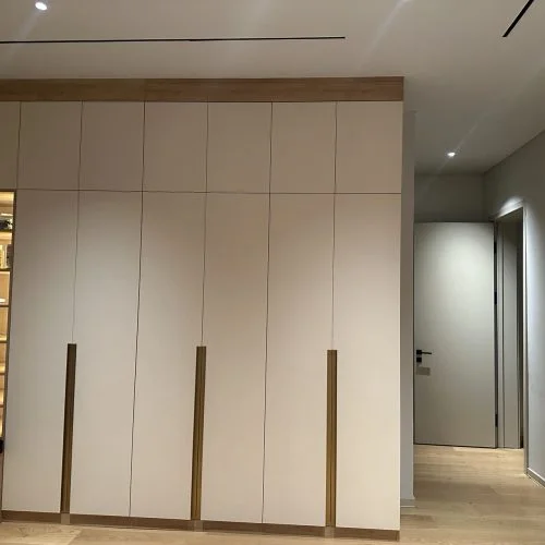 bedroom wardrobe with lit display niche