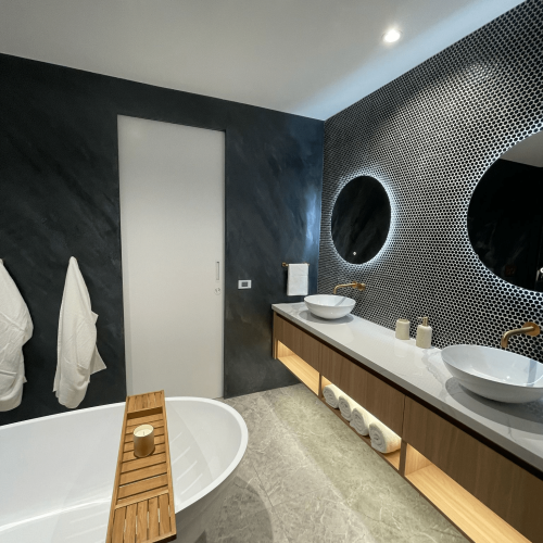 Luxury Whole House Custom in Melbourne 14 Luxury-Whole-House-Custom-in-Melbourne-penny-round-tile-vanity-with-dual-sinks