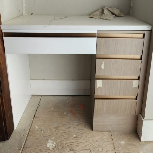 Pittsburgh High-end Whole House Custom bookshelf installation in modern home.