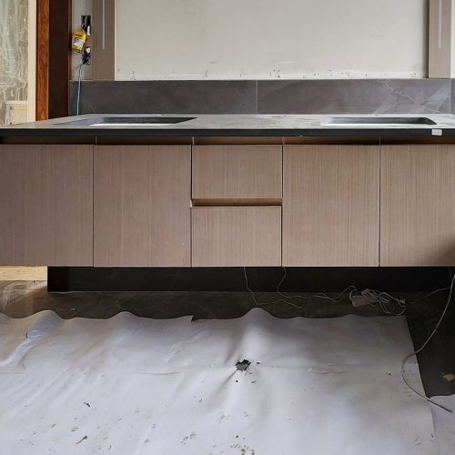 Pittsburgh High-end Whole House Custom in America 11 Elegant vanity in Pittsburgh High-end Whole House Custom project with sleek white surfaces and stylish hardware.