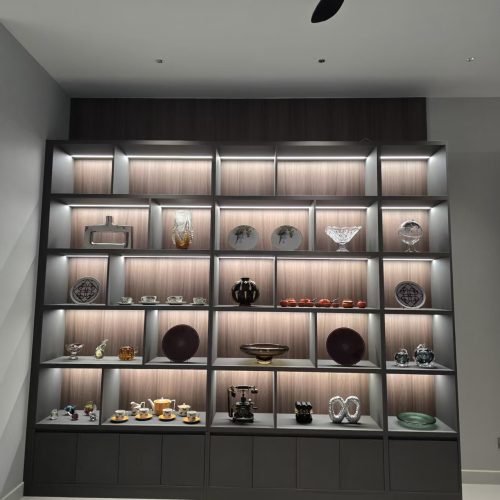 Singapore full house custom LED lit display cabinet showcasing decorative vases and art pieces