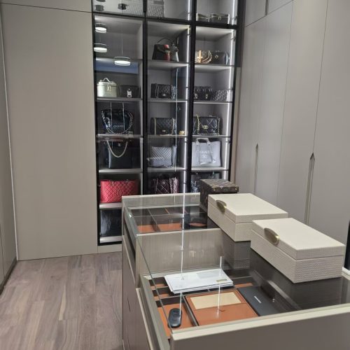 Singapore full house custom boutique wardrobe with central accessory island and LED display