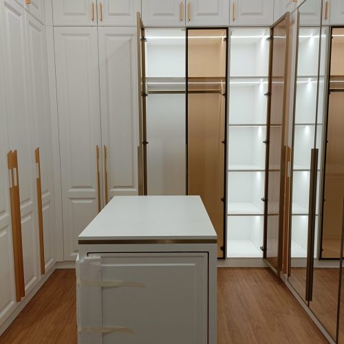 South Jakarta custom cabinets - walk-in closet with stylish mirrored doors