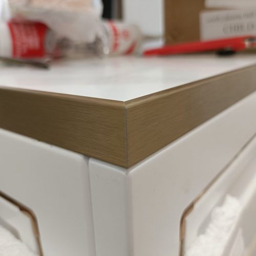 South Jakarta custom cabinets - close-up of the island edge corner with premium edge banding