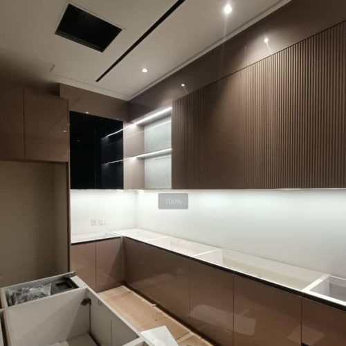 South Jakarta custom cabinets with modern lighting and sleek design for a kitchen.