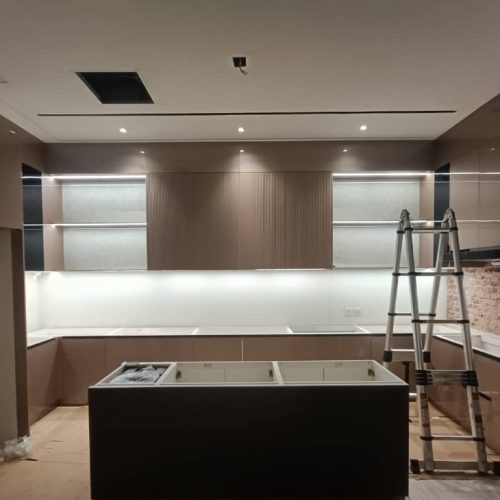 Custom kitchen cabinets installed in South Jakarta, featuring a streamlined, elegant design.