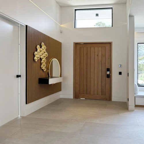 slatted timber feature wall with floating console