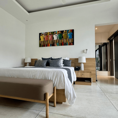 Bali project bedroom featuring a sleek custom nightstand and modern furnishings.