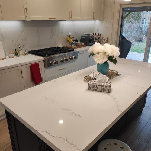 custom kitchen cabinet in Canada with marble countertop island and modern lighting
