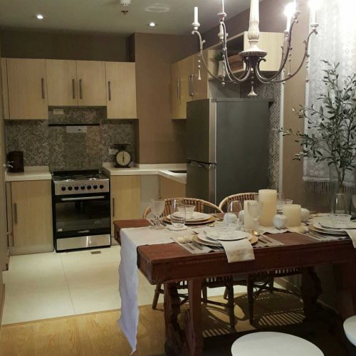 280 Units Philippines Hotel Project 4 A custom kitchen cabinet paired with a dining area, showcasing a hotel kitchen design in the Philippines.