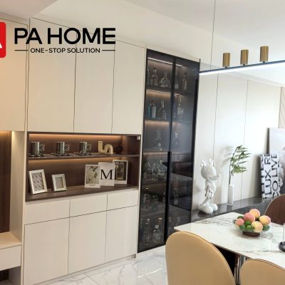 Elegant Tangerang Whole House Custom Interior Project 10 Living room with custom storage cabinets, glass display cabinet, wall panels, and dining area. in Tangerang whole house custom project.