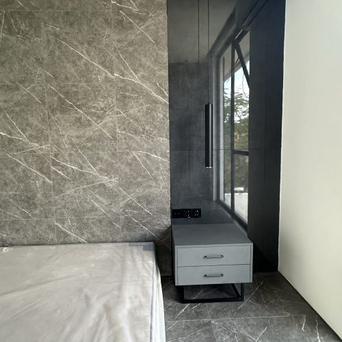 Umalas Creek Villa Custom Cabinets Project floating bedroom nightstand with drawers and pendant light