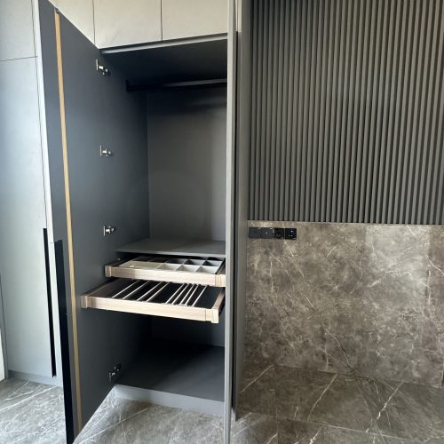 Umalas Creek Villa Custom Cabinets Project walnut veneer wall cabinets with quartz countertop and range hood