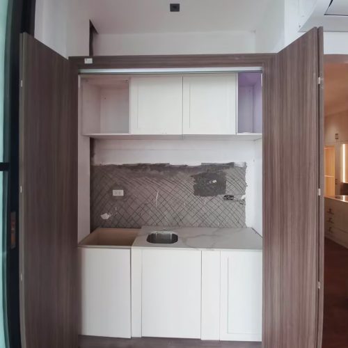 Whole House Custom in Philippines 1 Whole House Custom in Philippines - Modern pantry with open shelving and hidden cabinet spaces.